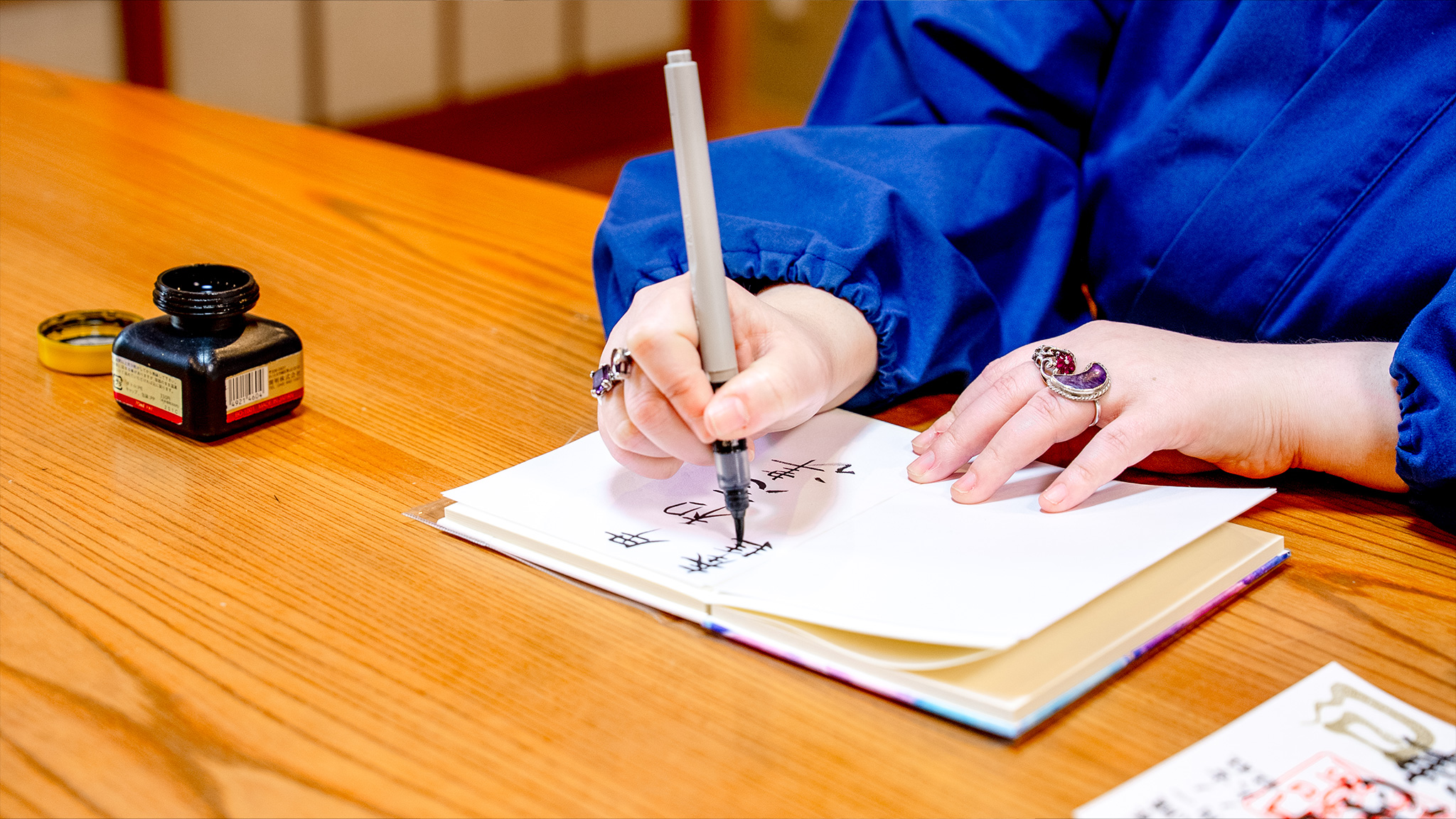Experience Samue Dressing, Morning Service, and Writing a Temple Seal